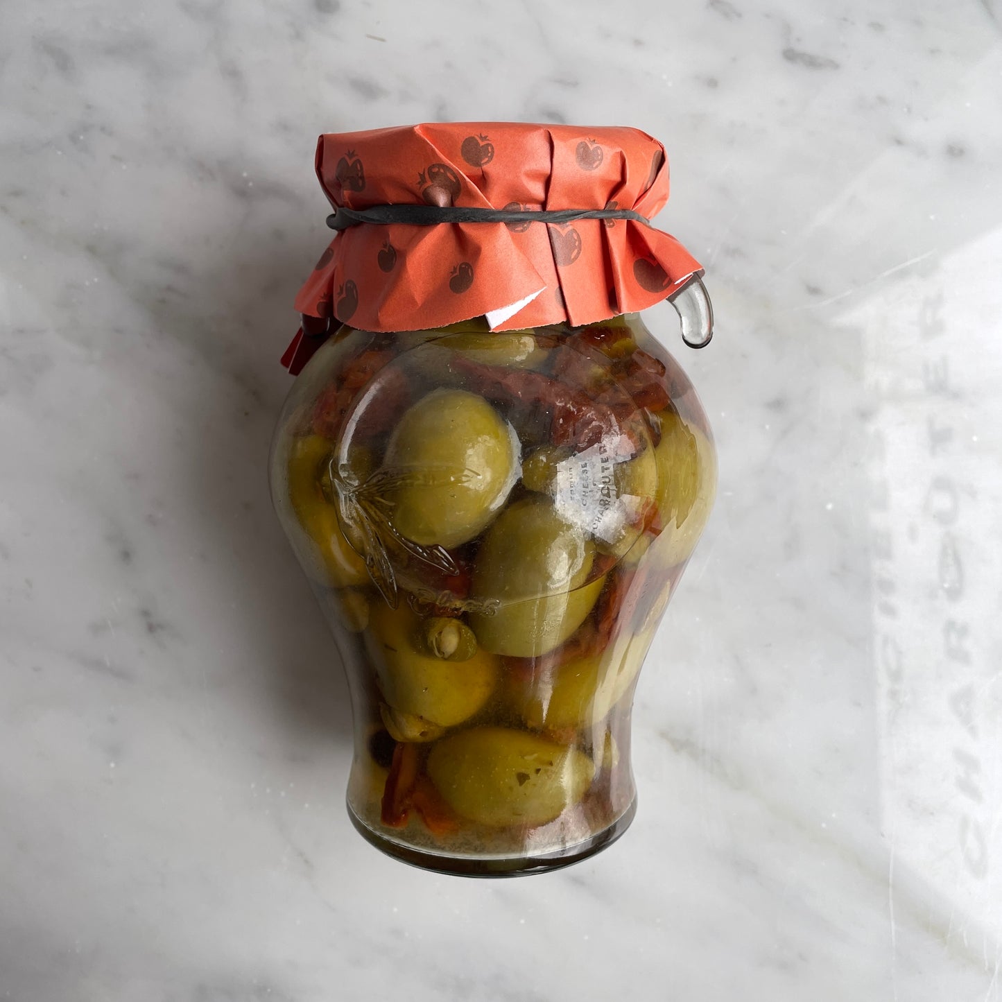 Gordal Olives with sundried tomatoes and capers in amphora